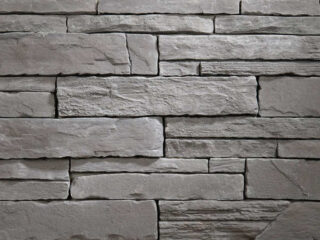 Voľne kladený fasádny obklad s prirodzenou štruktúrou v čiernej farbe. Obklad Alpský kameň F08 Mix